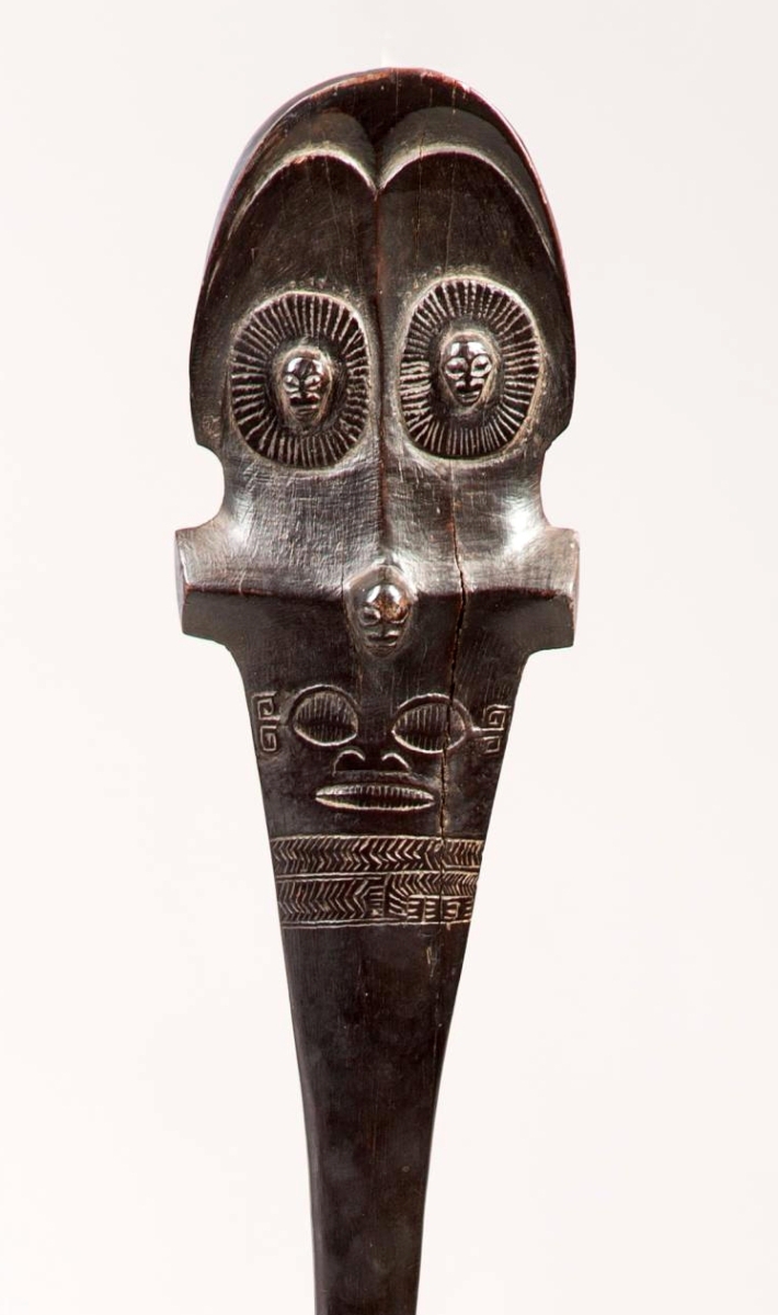 Leading the group of tribal objects was an important Nineteenth Century Marquesas Islands U’u war club, more than 42 inches long. Well-carved of a Polynesian hardwood with an arched top and hooded eyes over a face mask, it realized $34,800.