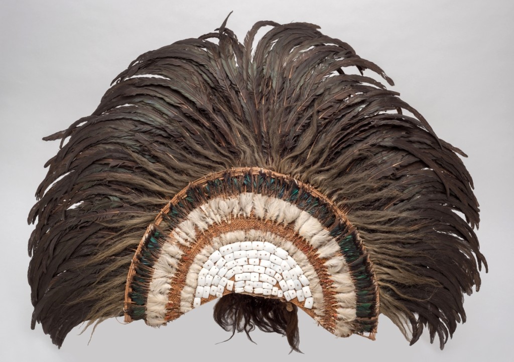 Feather headdress, Austral Islands, Eighteenth Century; feathers, shell, barkcloth, human hair, coconut fiber cord, vegetable fiber (various); 43-5/16 high by 43-5/16 wide by 8¼ inches deep. Peabody Museum of Archaeology and Ethnology, Harvard University Gift of the Heirs of David Kimball, 1899.