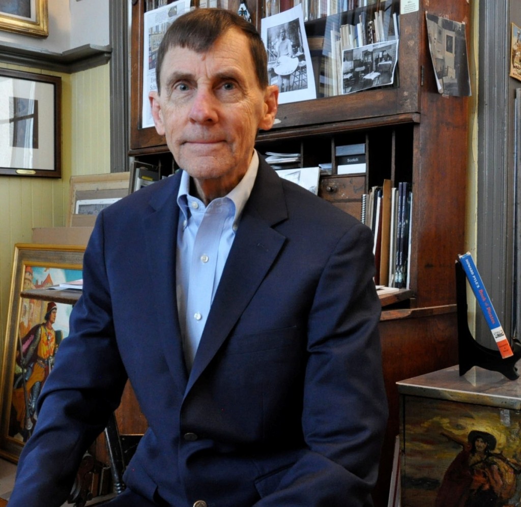 John Schoonover in front of his grandfather’s plantation desk in the studio.