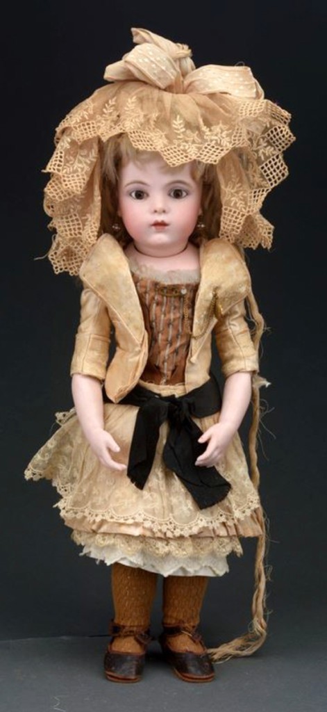 The top lot from the Beverly Hrubetz doll collection was this 17-inch-tall Bru Jne bébé No. 5 chevrot model with bisque arms and wooden lower legs, which sold for $11,070, between estimates.