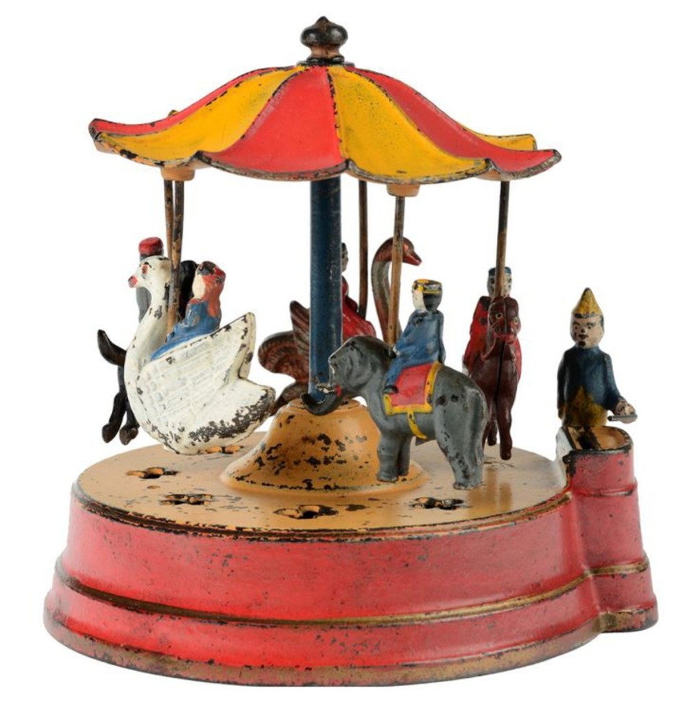 The highest selling mechanical bank in the sale, this near-mint condition Merry-Go-Round bank by Kyser & Rex would bring $55,350 to a phone bidder.