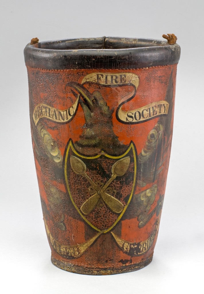 Attributed to John S. Blunt (1798–1835), inscribed “Firebucket owned by Caleb Currier,” Portsmouth, circa 1825. Painted leather; 12 inches high, 8¼ inches diameter. Portsmouth Historical Society; Gift of Mrs Alice Vaughn Johnson.