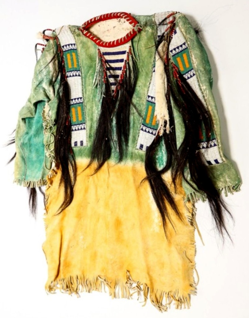 The Sioux beaded and dyed war shirt, with horsehair tassels attached, brought $9,300 and was the second highest price of the sale.