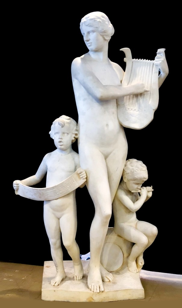 Art Deco sculpture by German-American artist Albert Weinert (1863–1947) included a young woman playing a lyre with two children at her side; dated 1924, the 78-by-40-inch signed sculpture realized $22,400.