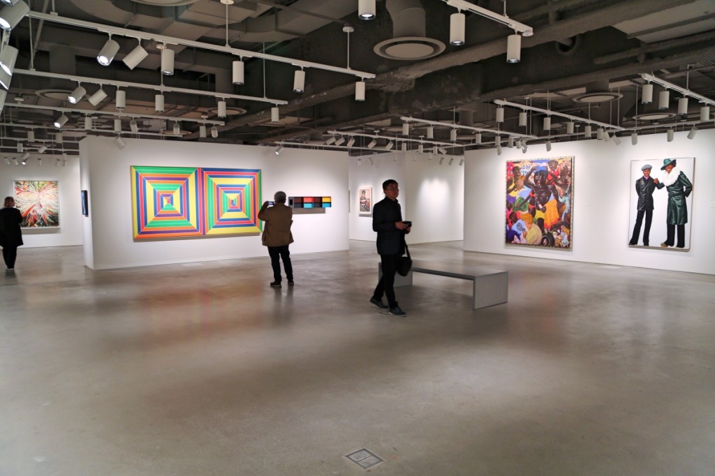 Visitors walk around Sotheby’s newly unveiled galleries, which expand the firm’s exhibition space from 67,000 to more than 90,000 square feet.