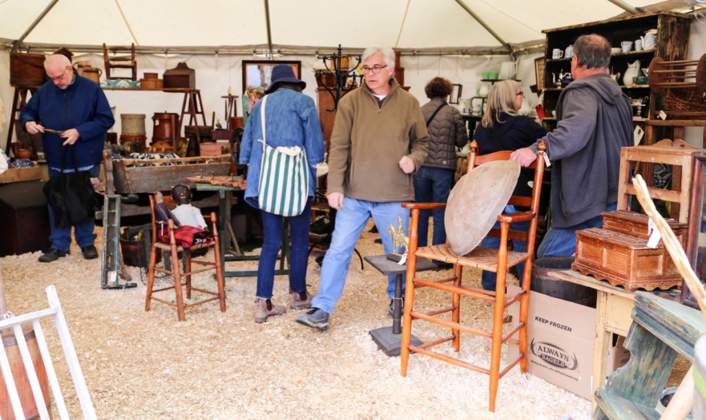 The ground was damp everywhere except the booth of Adin Poole and Tim Brigham, who form Ironstone Antiques, Hardwick, Mass. The dealers had laid down a nice pillow of sawdust to help sell their country Americana antiques, and it worked. Sold tags were on a few pieces shortly after the show opened. —Hertan’s