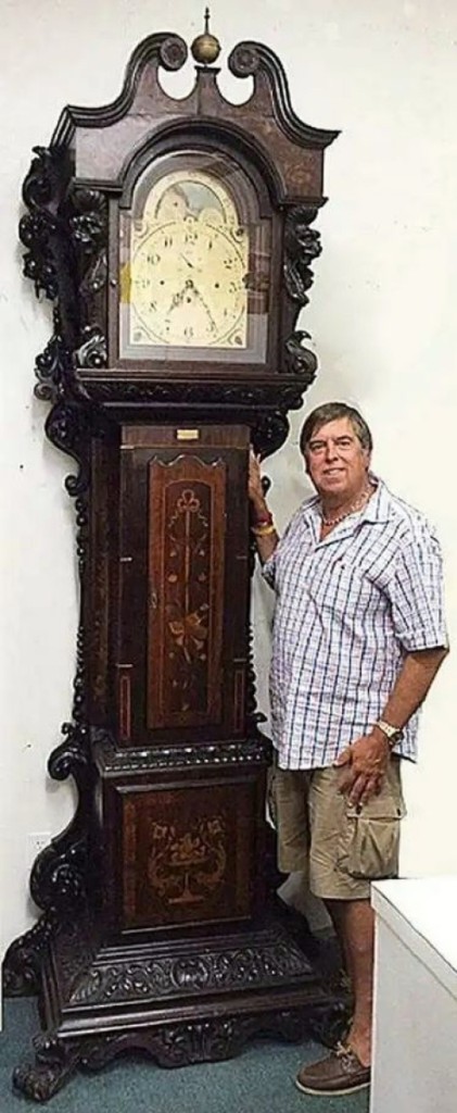 The second highest lot in the sale went to a 9-foot-tall mahogany case grandfather clock attributed to R.J. Horner, which caught $10,750. The piece had all-over inlay and was profusely carved.