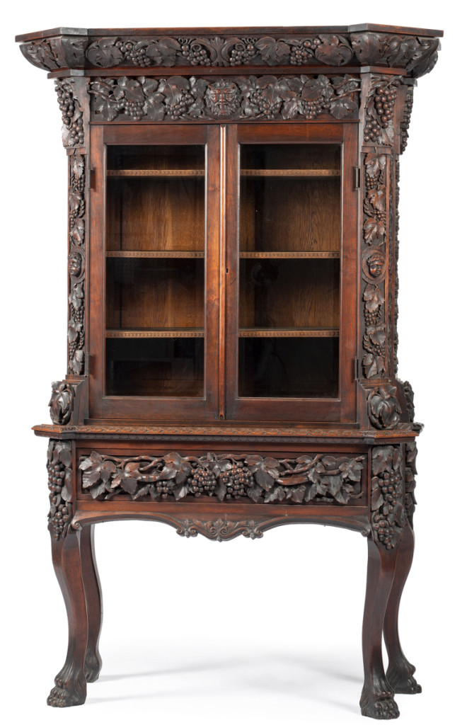 This extraordinary cabinet was carved in the 1860s by Henry and William Fry, hand carved with high relief naturalistic motifs, a real tour-de-force of late-Nineteenth Century Aesthetic Movement furniture, according to Jennifer Howe, a senior specialist in Cowan’s. The top lot of the two days, it sold at $18,750.