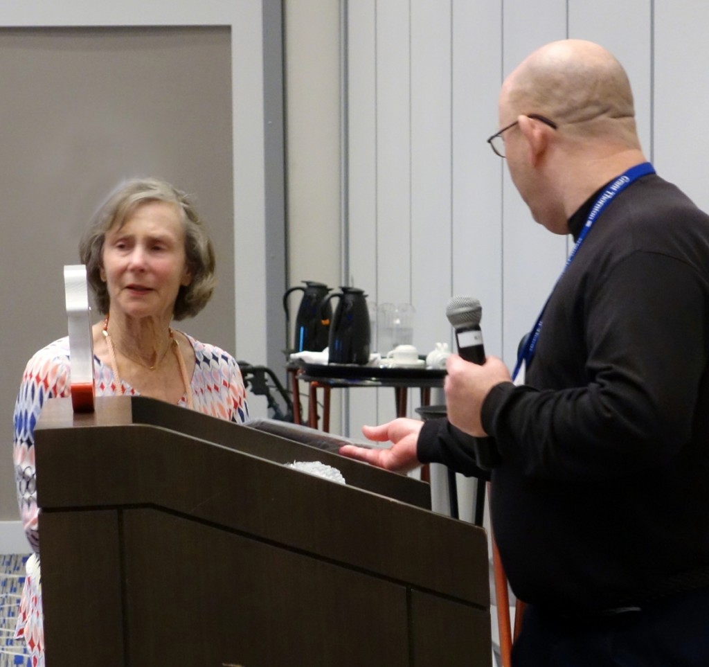 Liz Harold was presented a plaque for her many years of editing the club’s magazine, Penny Bank Post. Guy Williams, president, was the presenter.