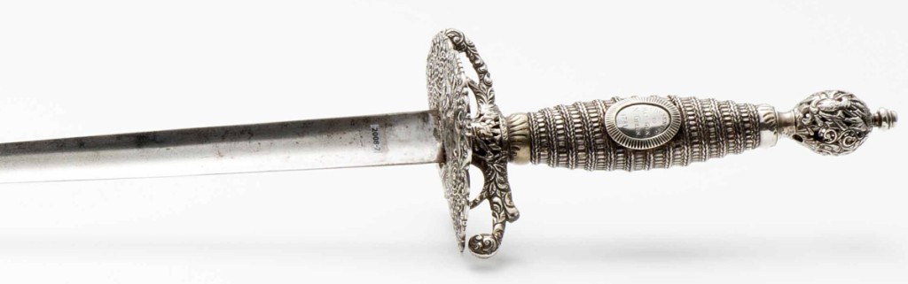 Silver hilted smallsword, London, England and America, 1765–70. Silver, iron/steel, wood, enamel and traces of gilding. Museum purchase and partial gift of Patty Voght in memory of Thomas G. Wnuck. Photo courtesy of The Art Museums of Colonial Williamsburg.
