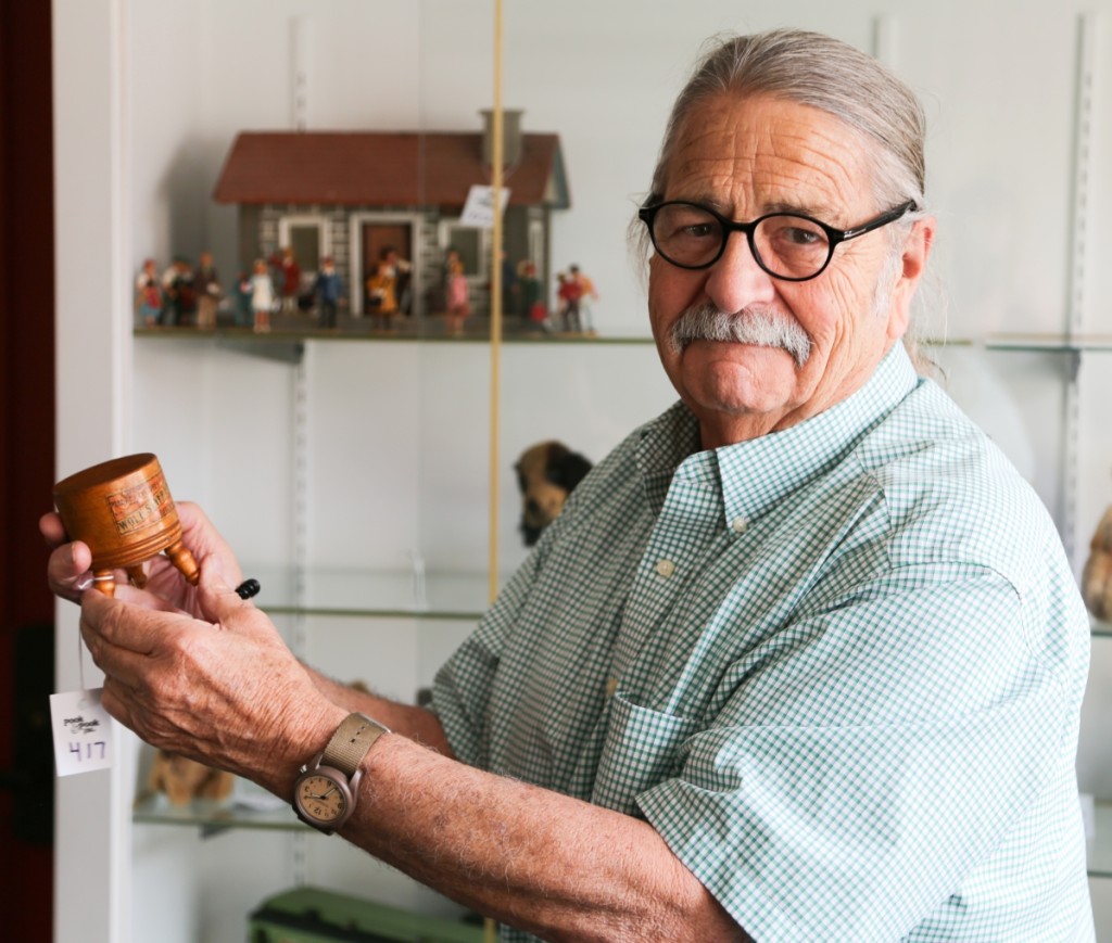 Noel Barrett had never seen another example like the salesman sample butcher block he holds in his hands here. “It has everything you want in a sample,” Barrett said, motioning to the label, which read “Wolf, Sayer & Heller — Chicago Butcher Supplies — Handsome Market Fixtures.” The piece would go on to sell for $3,172 above a $600 high estimate.