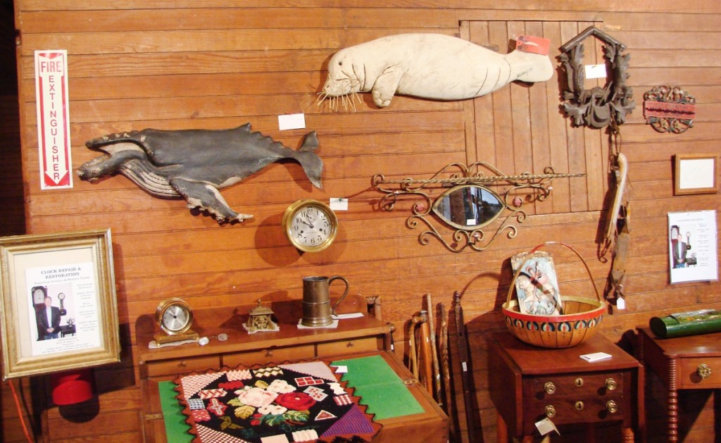 Harry Hepburn, Harrison, Maine, showcased two wonderful carvings by Wick Ahrens (1944–2016). The walrus, painted white, had a sold tag on it, and the other was of a whale, priced at $1,950.