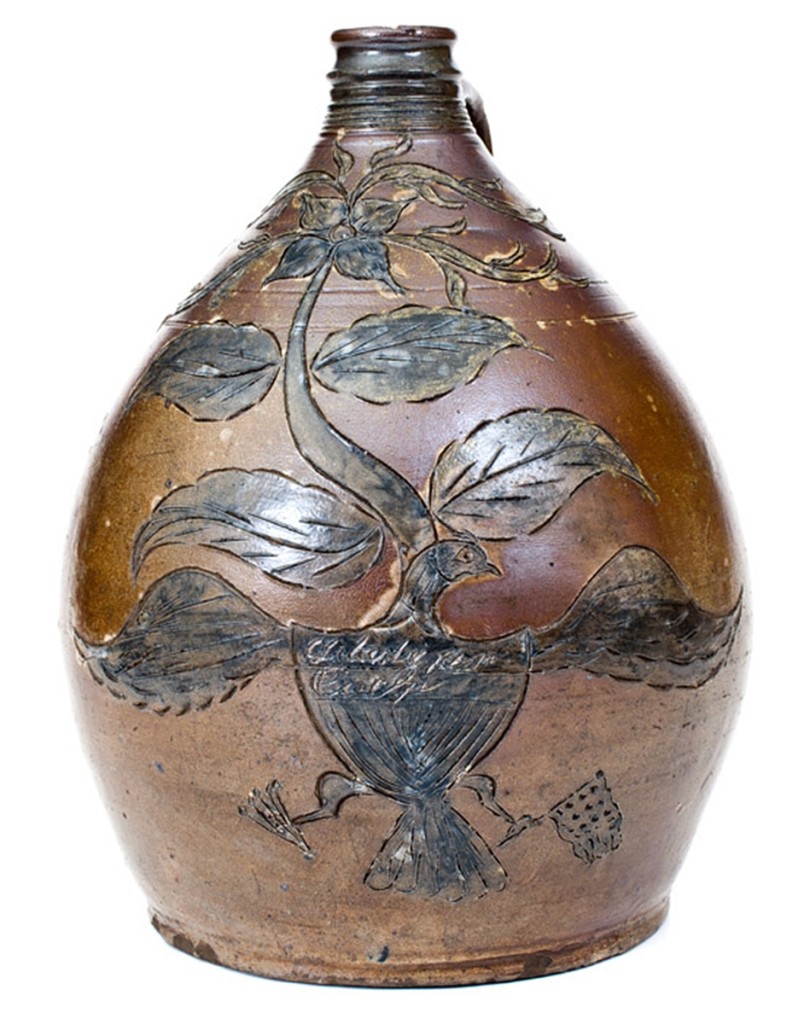 Early Nineteenth Century patriotic jug with Federal eagle, New Jersey, “Liberty for-Ever, L. Riggs, 1819” had been discovered in a house in the 1930s. It brought $44,250.