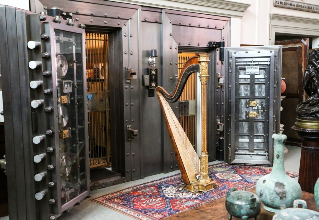 Five vaults provide secure storage for Tillou’s rarest pieces. The harp is from New York. Right are Chinese Warring States vessels.