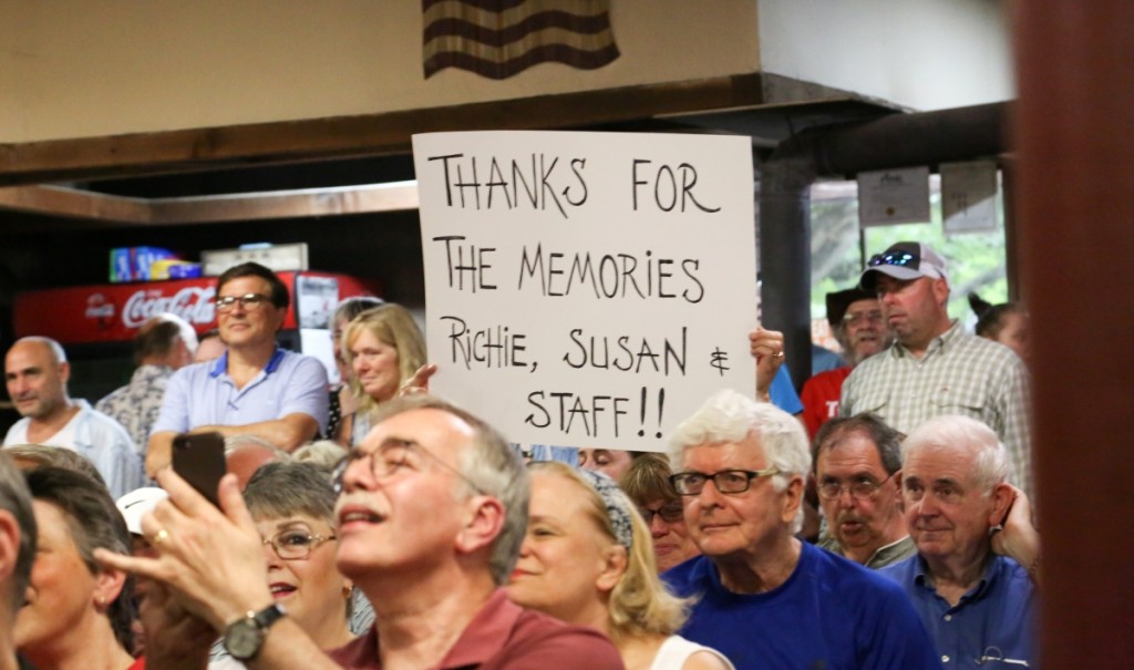 A regular at the sale held up this “Thanks for the memories Richie, Susan & Staff” sign before the sale got underway.