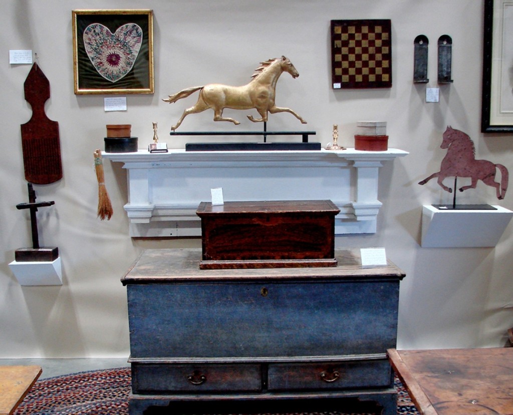 Utica, N.Y., dealers Griffith’s Antiques priced this 1790-1810 blanket chest in old blue paint at $1,495. The running horse weathervane with a zinc head, “Smuggler,” was probably made by Harris. It was priced $2,200.