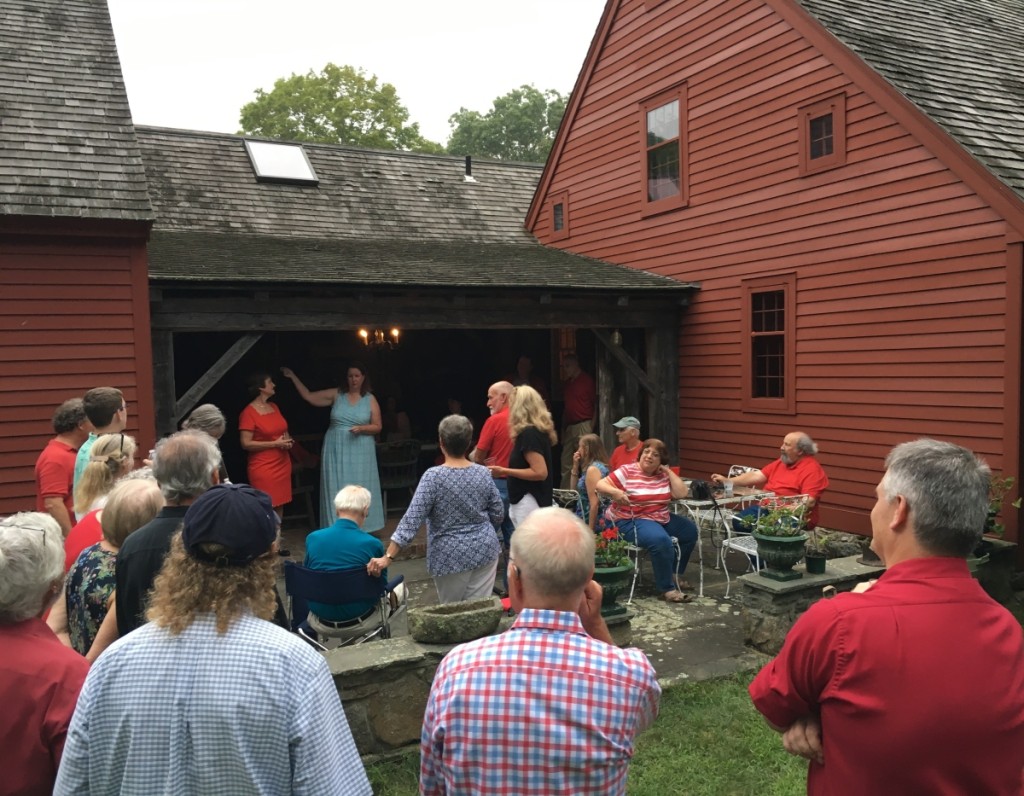 Lew Scranton’s daughters Abby and Rebecca address the gathering.