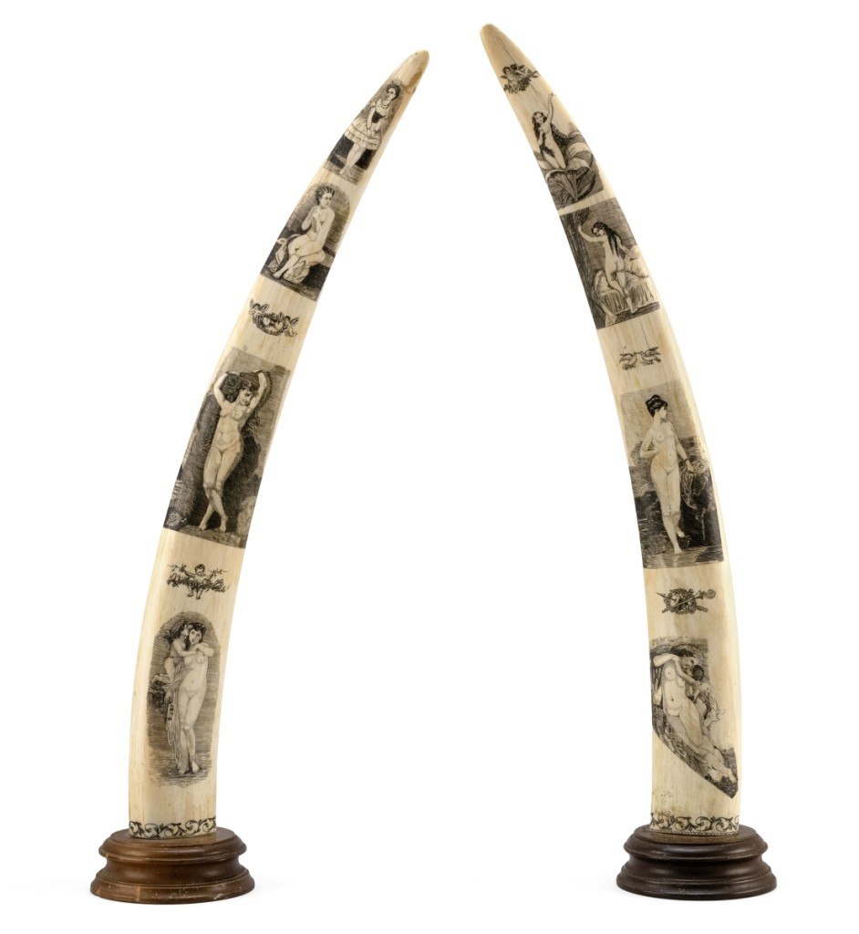 Walrus tusks engraved with nude women by N.S. Finney, a professional scrimshander in San Francisco. Dating to the second half of the Nineteenth Century, the tusks, from the collection of Sam and Donna McDowell, left the room at $45,000 ($50/100,000).