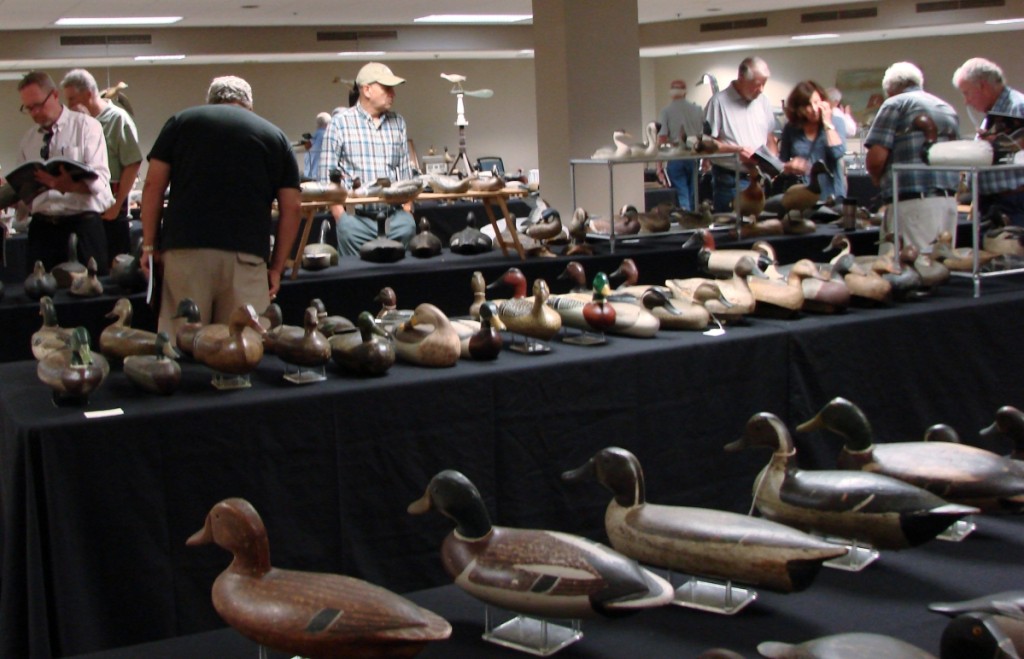 Prospective buyers inspect the offerings before the start of sale.