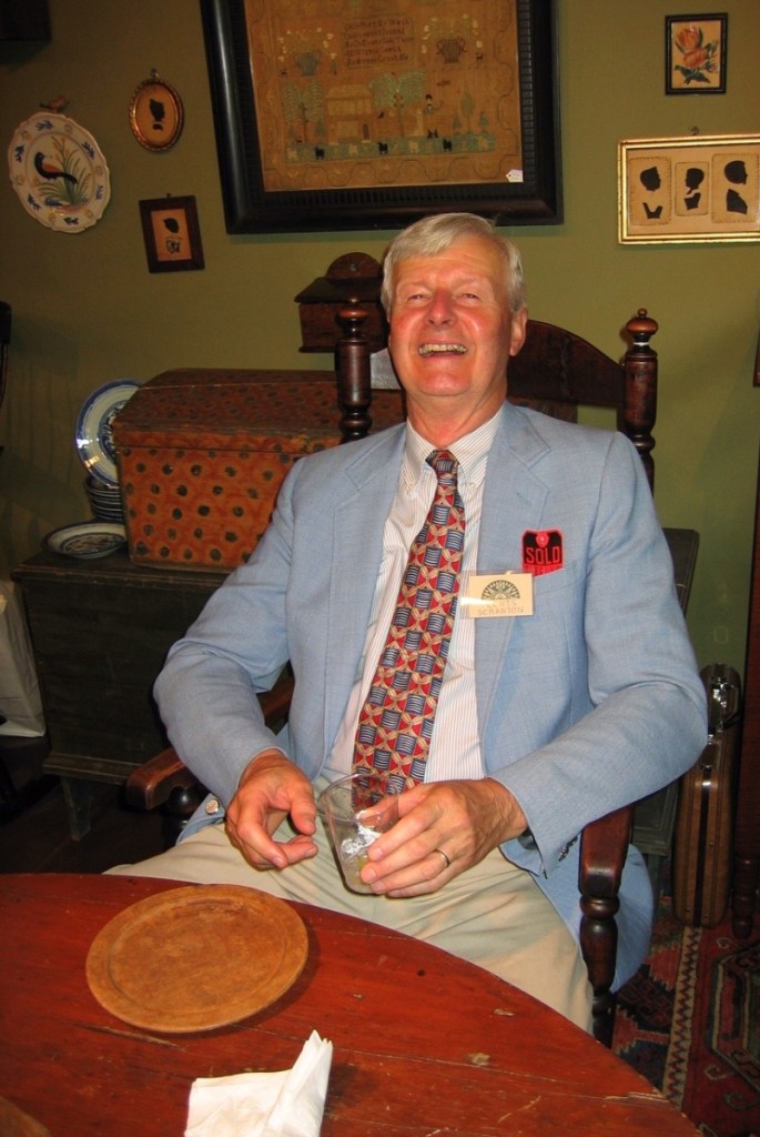 Caught without a pocket square in his jacket, Scranton improvised something better. Marion Antiques Show, August 2003.