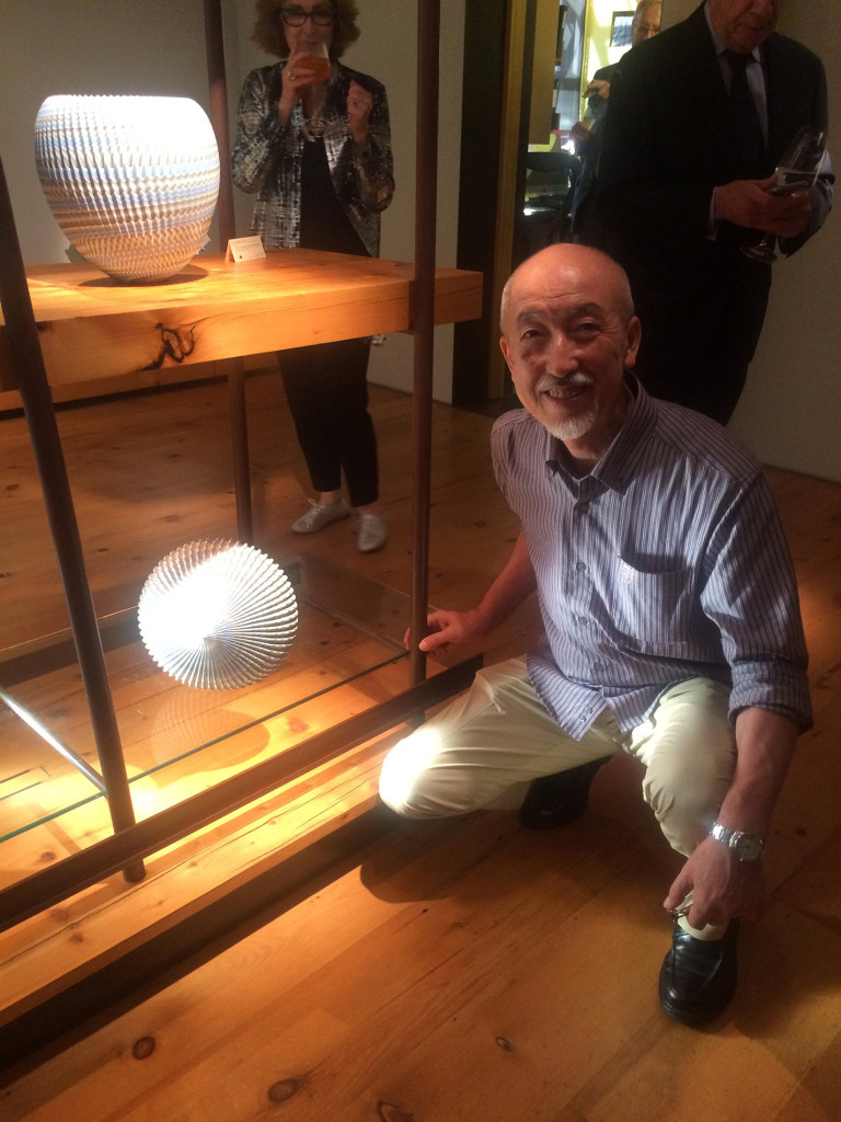 Ogata Kamio with “Lunar Landing,” 2019, marbleized stoneware, 10¼ by 10½ inches. 