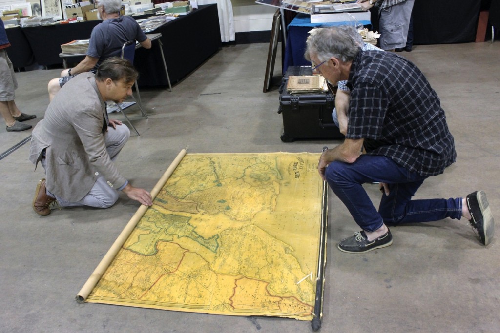 The wide open aisles at this show allow for inspection of some larger items, such as this 1860s map of New York and its environs at John Bale Book Co., Waterbury, Conn.