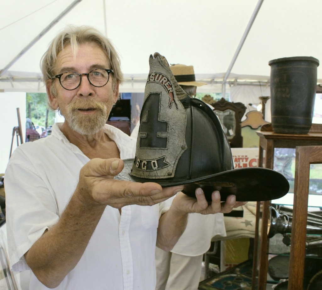 Joe Baczewski, Southington, Conn., was a fireman for 31 years and collects early firefighting items. He had a number of them on display, such as this hat from the 1880s. —Hertan’s