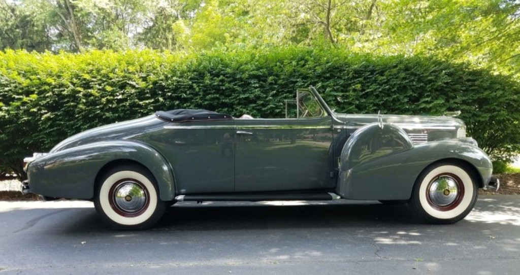 Vintage cars were led by this 1938 Cadillac Series 75 Fleetwood convertible that drew bids to $187,500.