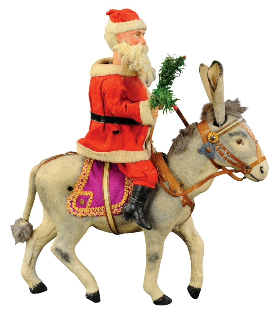 The top price paid for a Christmas piece was $26,400, for this Nodding Santa on Nodding Donkey that also had pivoting ears ($7/10,000).
