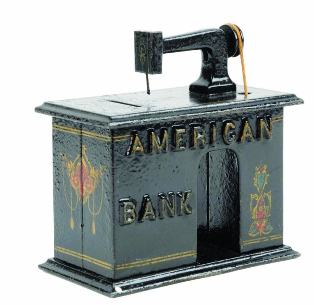 In near mint condition with embossed letters, an American Bank mechanical bank brought above estimate at $15,990.