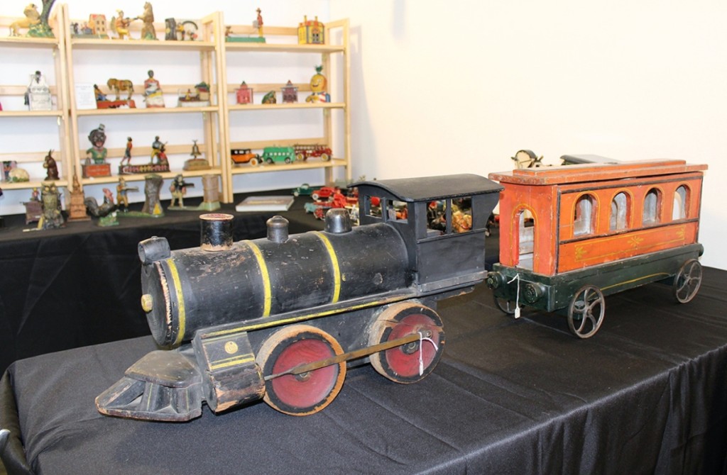 This folk art train had been lovingly made by a father for a child around the turn of the century, according to Don and Betty Jo Heim, Jersey Shore, Penn. The engine and car double as a toy box.