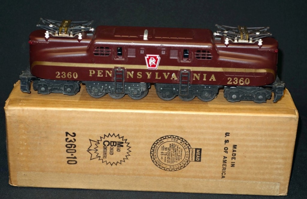 This group of two Lionel GG1 locomotives, one still sealed in its box, brought the highest price of all trains and accessories in the sale. It sold for $2,596.
