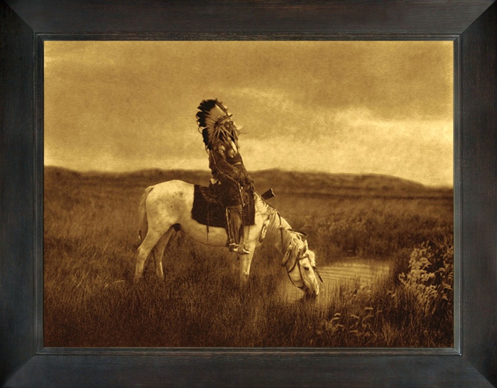 “An Oasis in the Badlands,” Edward Curtis. Chief Red Hawk, Oglala Lakota, on his horse getting a drink. Red Hawk fought at the Battle of the Little Bighorn alongside Crazy Horse, leader of the Lakota nation. Gold Tone by Mountain Hawk.