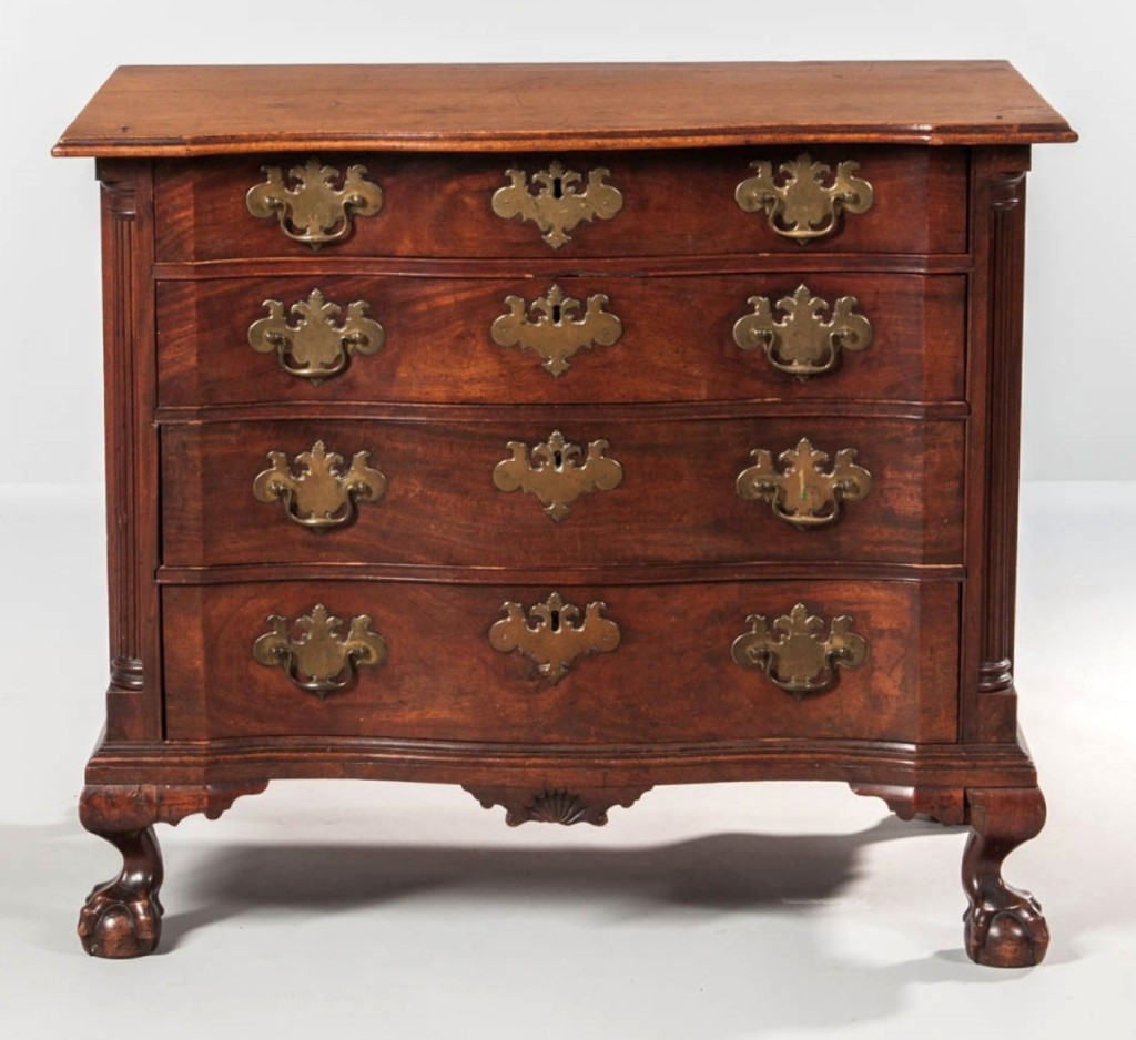 Skinner had an idea that this might be the top lot in the sale, and it was. The Chippendale carved mahogany reverse serpentine bureau sold to a phone bidder for $291,000 ($50/100,000).