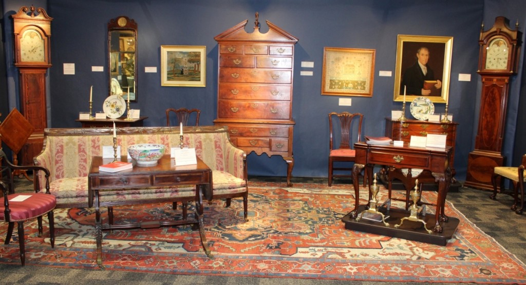 The big sale of the show for Bernard & S. Dean Levy Inc was the George C. Curtis Philadelphia Chippendale card table. It is shown on the plinth in the center right of this photograph and sold on opening night.