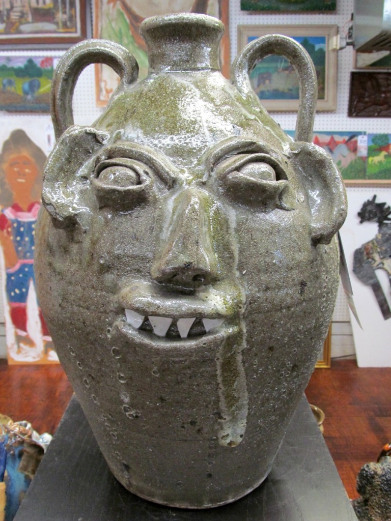 Top pot in this sale was a Burlon B. Craig salt glaze tall face jug at $2,040.