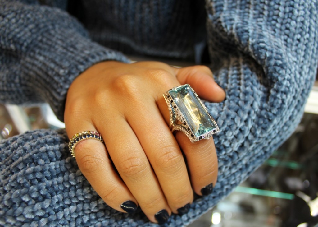 Sheila Kabablah with Steven Galapo Diamonds modeled this 30-carat aquamarine and platinum Art Deco cocktail ring that the gallery had acquired a few months prior to the show. It was priced around $12,000; it saw interest at the show but at press time was still available. New York City.