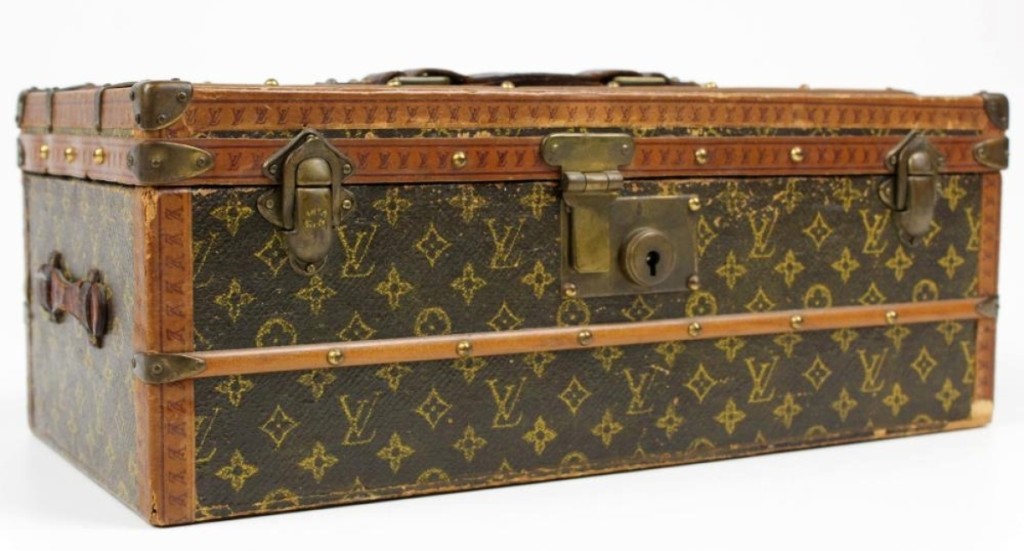 At only 11 inches wide, this unusually small Louis Vuitton trunk or jewelry box was in fine condition and earned $8,050.