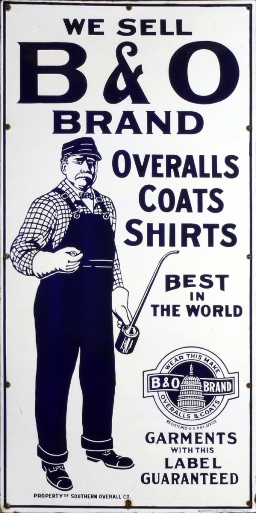 The collection was led by this two-color porcelain enamel sign with bold graphics, full length portrait of a railroad worker with oiler and a company logo resembling that of the B&O Railroad. It pulled in at $23,500, won by a bidder in the room.