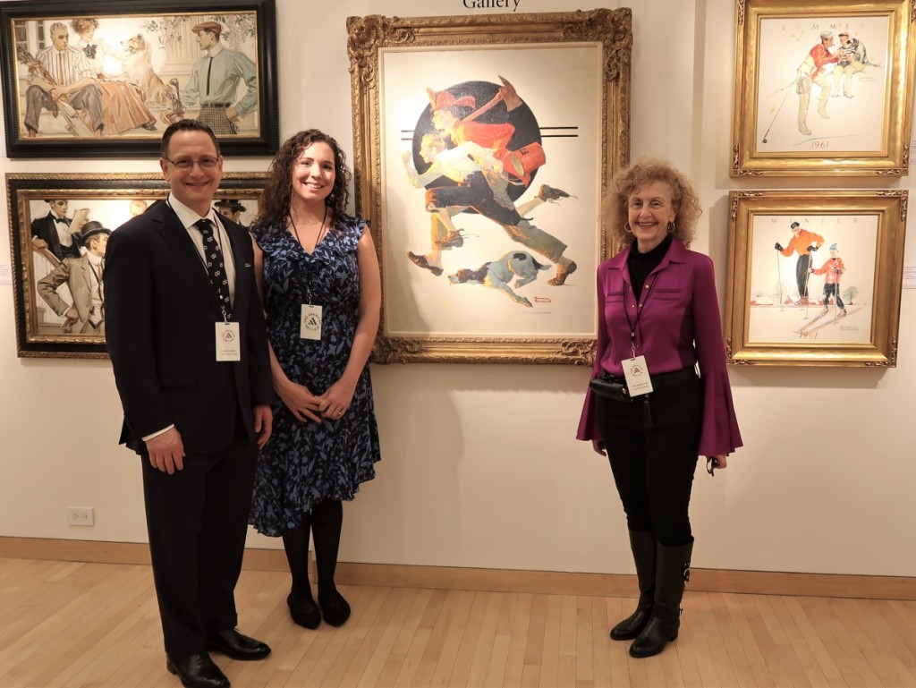 Andrew Goffman, Sara Bliss Cohen and Judy Goffman Cutler with the 1931 oil on canvas “Volunteer Fireman” by Norman Rockwell, reproduced in the Saturday Evening Post the same year.