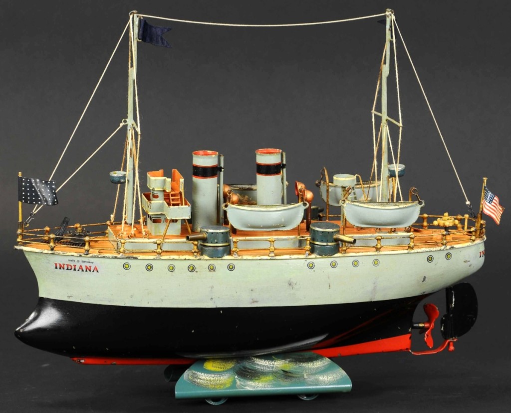 Marklin Battleship Indiana is clockwork driven and was originally named Jquique which Mr Downey changed. With a few paint chips filled in, and cradle and flags replaced, it is noted to be in excellent to pristine condition. The purchase price of $22,800 was above high estimate.