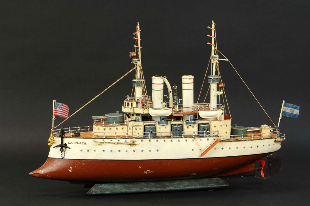 The Macklin battleship La Plata, clockwork, likely the crown jewel of Sam Downey Collection, hailing from Argentina, is in museum condition, is impressive to look at, and in regard to authenticity, it doesn’t get much better. It measures 28 inches long and is in excellent to pristine condition. It sold on Saturday, November 10, for $204,000. This battleship was in the collection of Bill Bertoia at some point.
