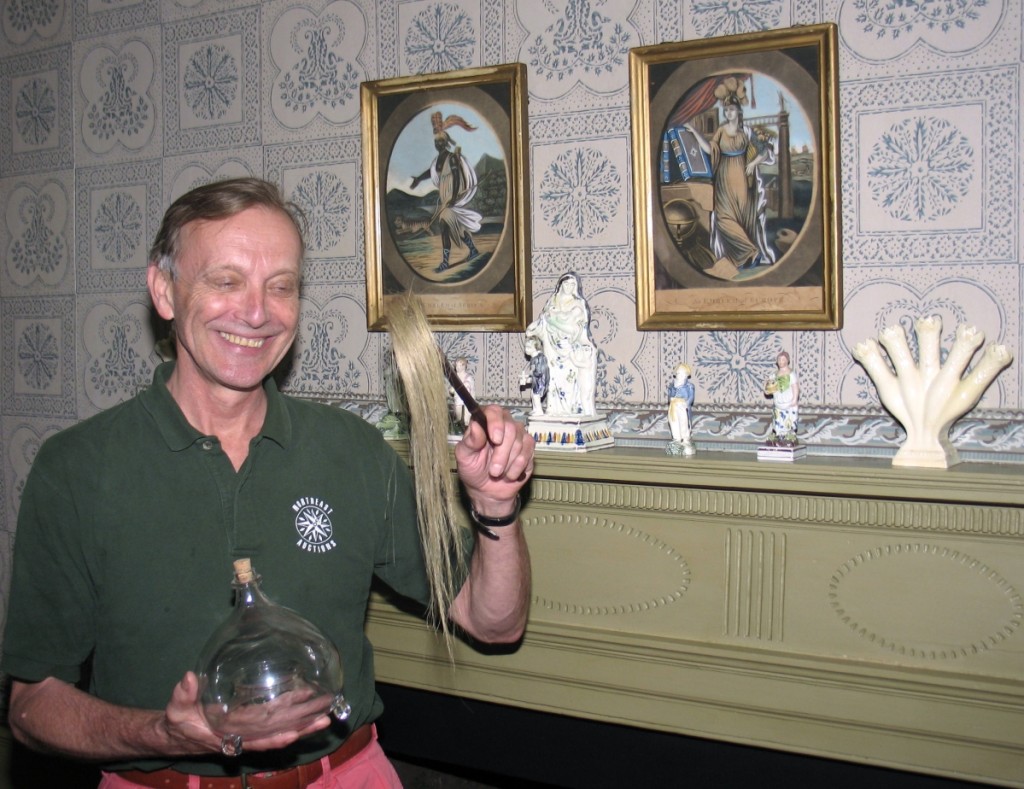 Crossman with a fly swatter at Walsh House, Strawbery Banke. Exotic curiosities remain an abiding interest.