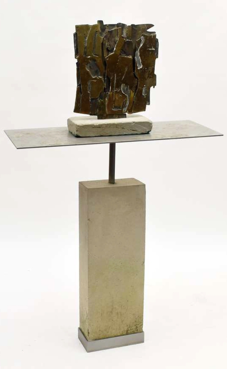 One of the highest priced items in the sale was this Brutalist bronze by Pietro Consagra. It was an abstract piece mounted on a cement and steel base, signed “Consagra ‘61” and it sold for $19,500.