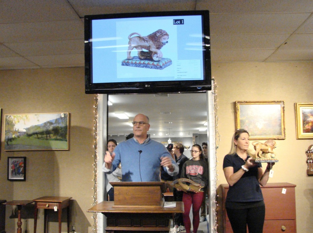 All items at Smith’s auctions are brought to the front of the gallery so that buyers can see what they’re bidding on. The colorful Staffordshire lion got the day off to a good start, bringing $1,035.