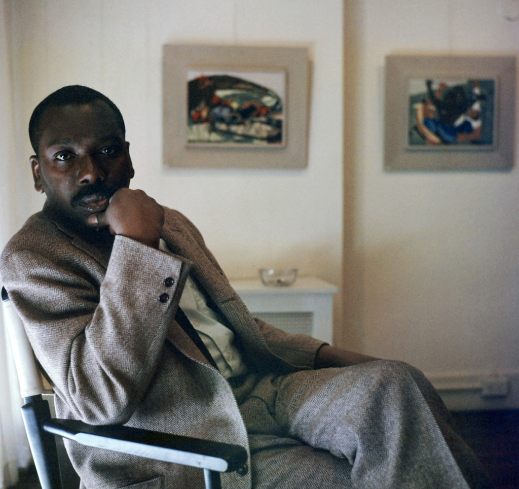 Artist Jacob Lawrence with Panel 26 and Panel 27 from “Struggle: From the History of the American People,” 1954–56. ©Robert W. Kelley/The Life Picture Collection/Getty Images.