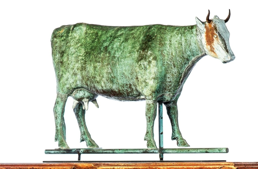 This Harris & Co., Boston, late Nineteenth Century full-bodied copper cow with cast zinc and iron head weathervane sold within estimate at $5,040.