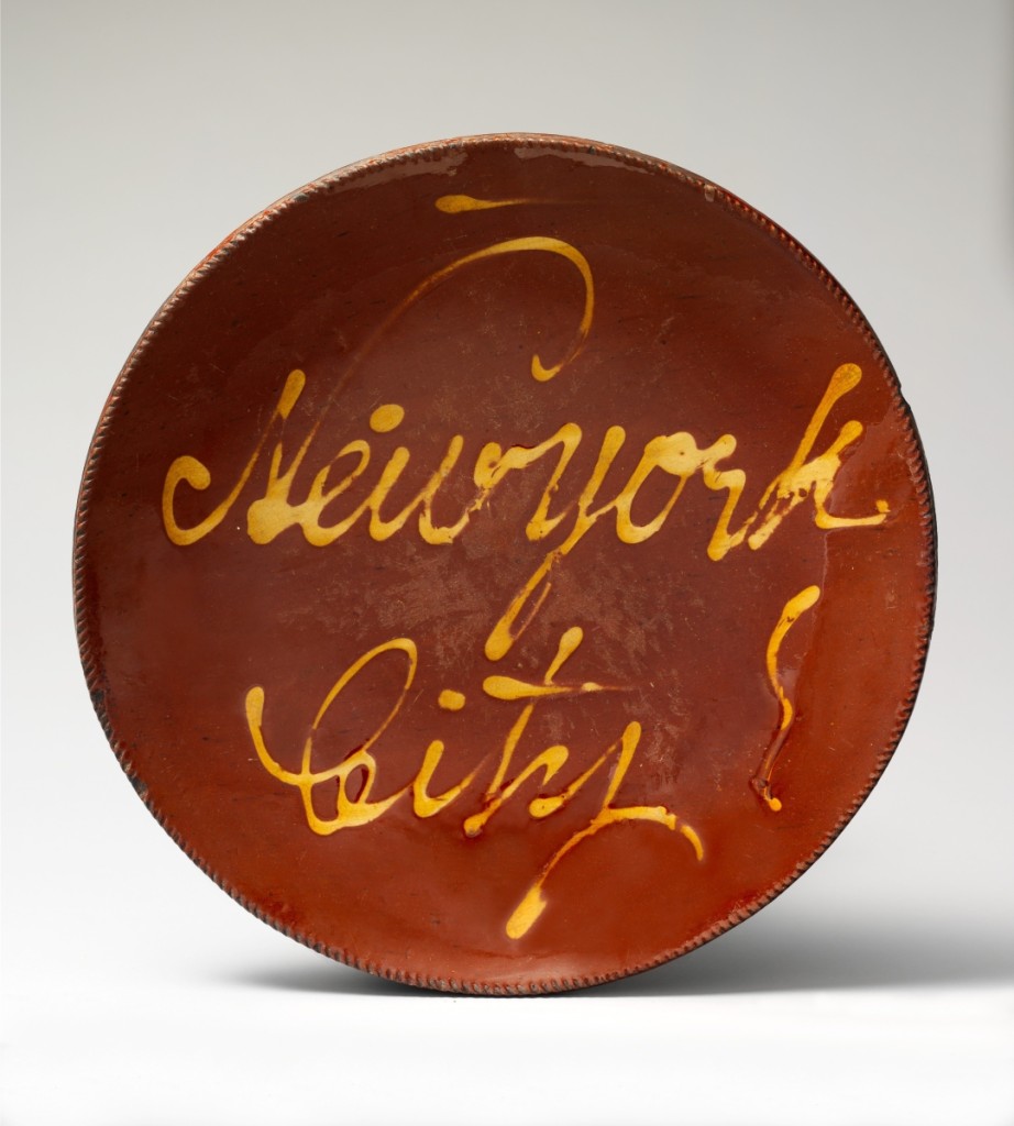 Nineteenth Century slip script red earthenware dish, “New York City,” made at the Asa Edward Smith Pottery in Norwalk, Conn., circa 1825-50. Courtesy Metropolitan Museum of Art.