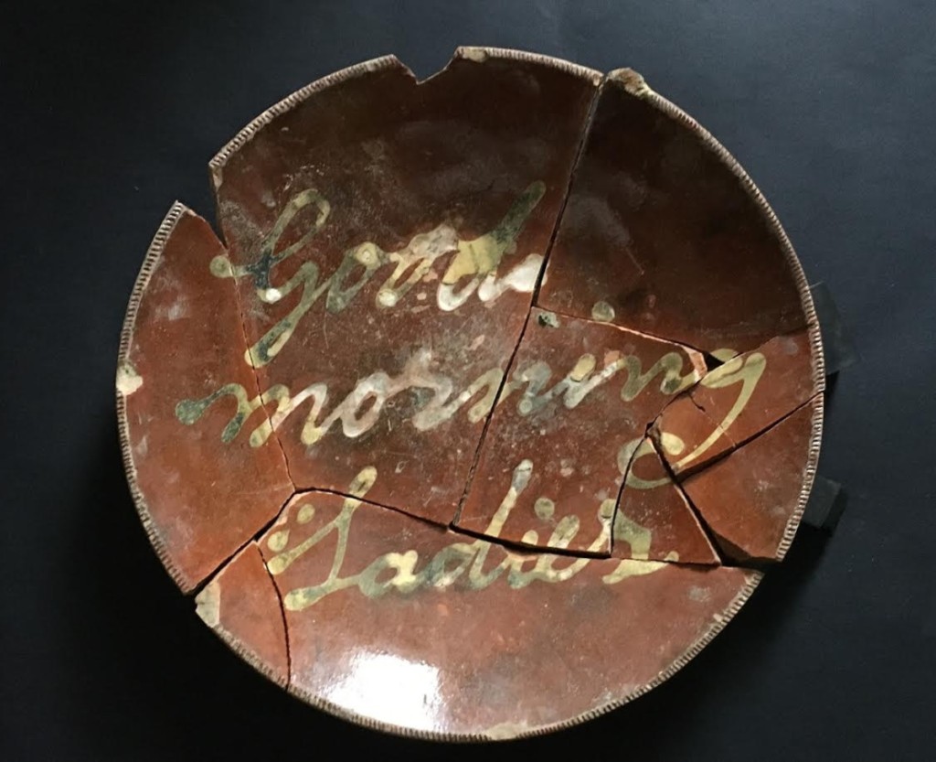 Nineteenth Century slip red earthenware dish, “Good Morning Ladies,” possibly made by John Betts Gregory in Norwalk, Conn. The dish was recovered from an 1835-45 brick line privy at 33 Van Duzer Street on Staten Island. Courtesy Scott Jordan, Maribelle Costes and Dan McGee.