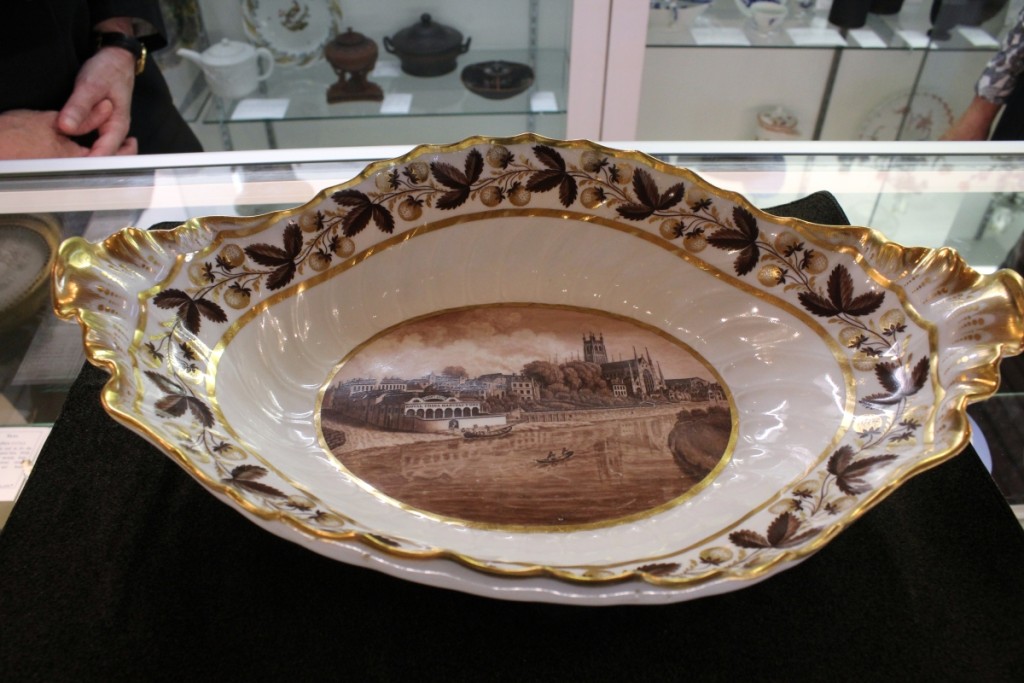 This large dish, called a comport, Worcester, circa 1800, is illustrated with a view of the Flight & Barr Porcelain Factory. Although a transfer print, the hand painted platter is rare, according to Etruria Antiques Gallery, Melbourne, Australia.